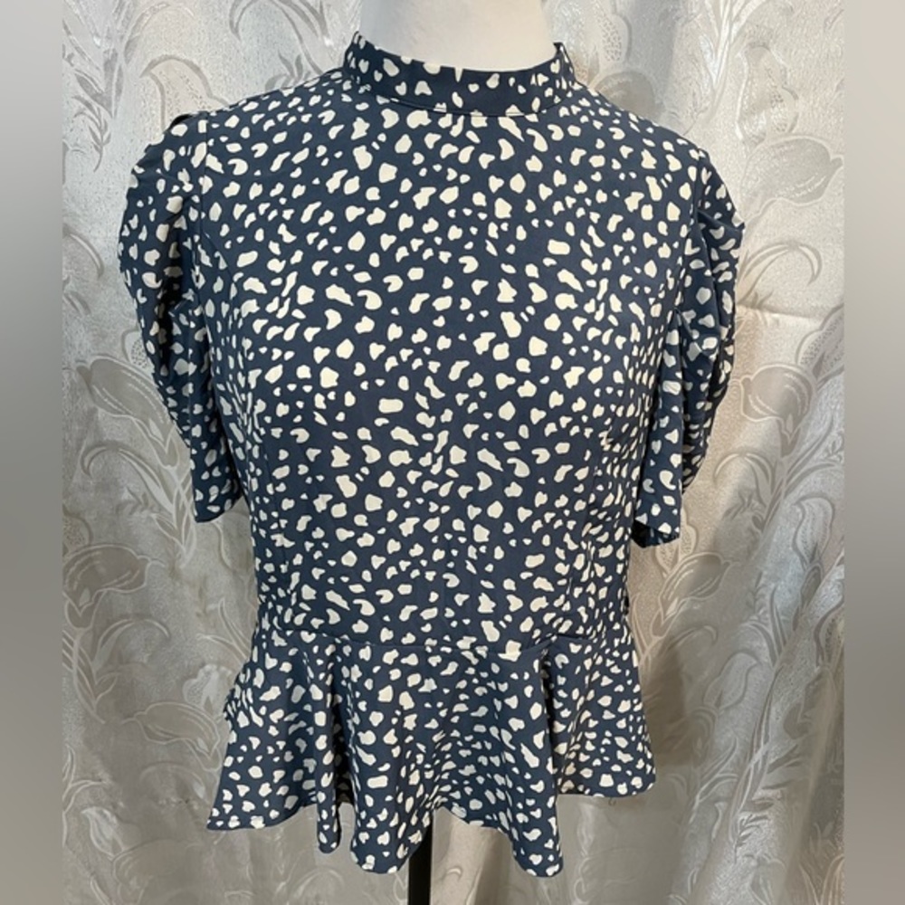 Feel In Blue & Creme Printed Top With Ruffled Hem